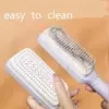 فرشاة شعر ضد التشابك بيد دوارة لسهولة التنظيف - Anti-Tangle Hair Brush with Rotating Handle for Easy Cleaning